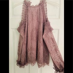 Cold shoulder long sleeved lace top.